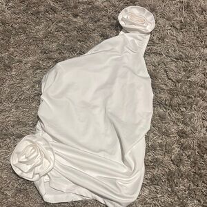 Elegant White One-Shoulder Top with Floral Accents